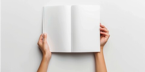 A woman hand holding a white magazine book mockup