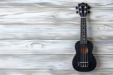 Obraz premium Black ukulele on white table with blank space music theme