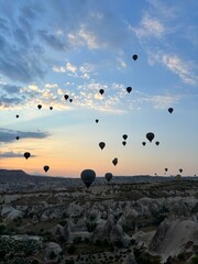 Hot Air Balloons at Sunrise Over Cappadocia's Fairy Chimneys