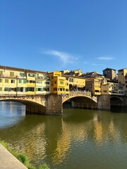 Obraz premium Ponte Vecchio and Reflections on the Arno River Florence