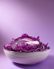 Obraz premium Fresh Purple Cabbage in a bowl on Light pastel purple background