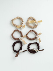 Children's hair accessories. Silk or satin hair band. Set of hair bands. Fashionable hairstyle.