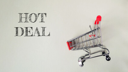 Shopping cart with the word HOT DEAL written on it