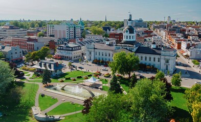 Confederation Park and the Kingston City Hall in downtown Kingston, Ontario, Canada.