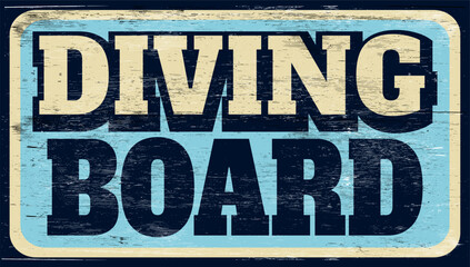 Fototapeta premium Aged and worn diving board sign on wood