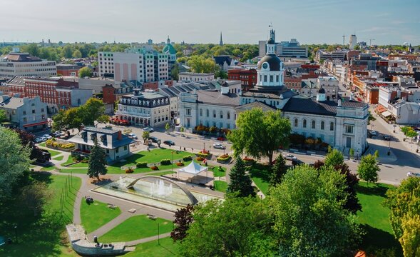 Confederation Park and the Kingston City Hall in downtown Kingston, Ontario, Canada.