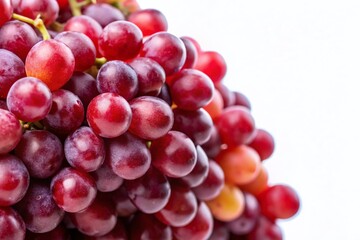 Fototapeta premium Close Up of Fresh Red Grapes on White Background with Copy Space - Perfect for Fruit and Healthy Eating Concepts, Ideal for Food Photography and Marketing Use