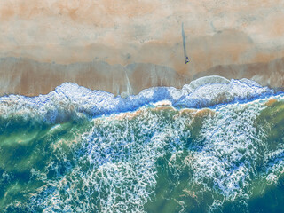 Walking by the surf in the morning.