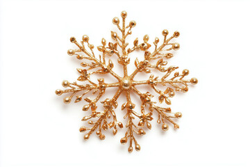Glittering golden snowflake ornament on a white background