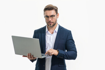 Business man using laptop. Male business man worker watch video on computer laptop. Serious business man hold laptop computer. Caucasian business man in glasses work with laptop, studio portrait.