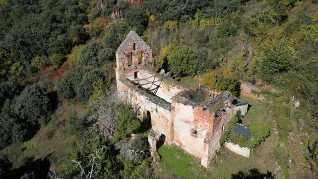 Aerial perspective of San Esteban hermitage and surrounding forested landscape in Rubi&aacute;, Galicia