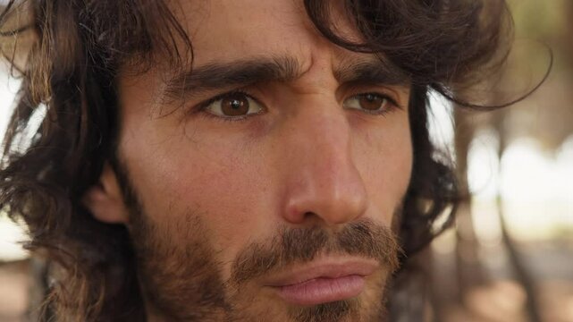 Long Hair Man Chews Food With Bad Taste And Vomits Behind A Tree In Nature