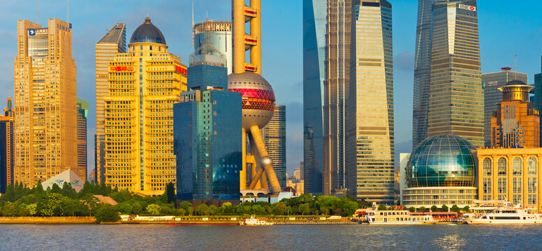 Oriental Pearl TV Tower and high-rises by Huangpu River, Pudong, Shanghai, China