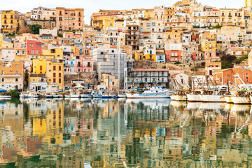 Italy, Sicily, Agrigento Province, Sciacca. April 16, 2019. Fishing boats in the harbor of Sciacca, on the Mediterranean Sea.
