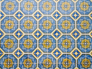 Portugal, Aveiro. Colorful azulejo tiles on the exterior wall of house.