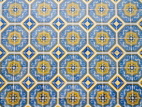 Portugal, Aveiro. Colorful azulejo tiles on the exterior wall of house.