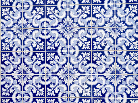 Portugal, Aveiro. Colorful azulejo tiles on the exterior wall of house.