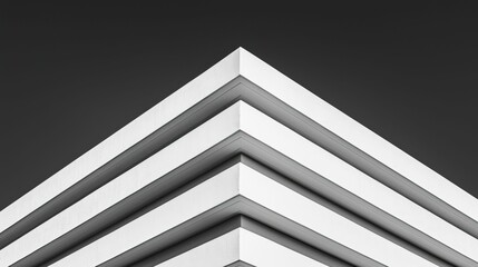 Obraz premium model modern photography and avant-garde, A minimalistic image featuring layered white geometric shapes against a dark background, emphasizing contrast and modern design.