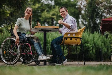 Fototapeta premium A joyful moment between a boy with Down syndrome and a girl in a wheelchair playing backgammon outdoors, highlighting friendship, inclusion, and fun.