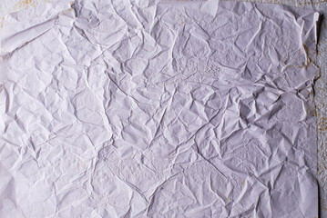 white crumpled and creased glued wrinkled paper poster texture background