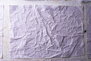 Obraz premium white crumpled and creased glued wrinkled paper poster texture background