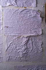 white crumpled and creased glued wrinkled paper poster texture background