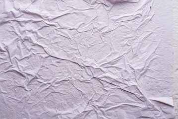 white crumpled and creased glued wrinkled paper poster texture background