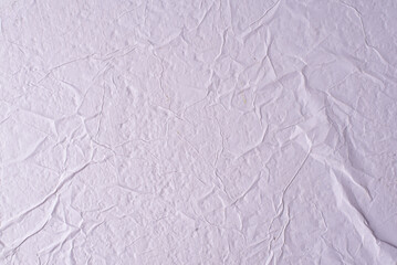 white crumpled and creased glued wrinkled paper poster texture background