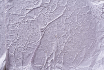 white crumpled and creased glued wrinkled paper poster texture background