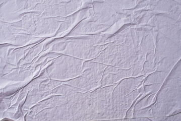 white crumpled and creased glued wrinkled paper poster texture background