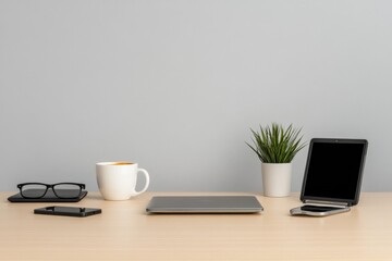 minimalist workspace with electronic devices and coffee