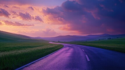 Fototapeta premium Serene Road Through a Field at Sunset