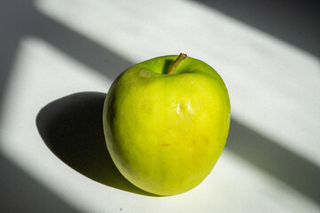 green apple on black background