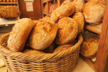 A Warm and Freshly Baked Artisan Bread Presented in a Charming Rustic Bakery Basket