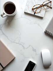 White table with coffee cup, cell phone, mouse, and notebook