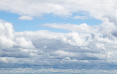 Sky replacement clouds puffy gray and white with blue sky