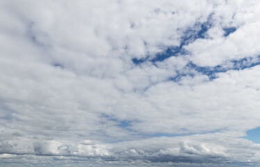 Sky replacement clouds puffy gray and white with blue sky