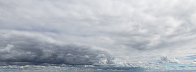 Sky replacement clouds puffy gray and white with blue sky