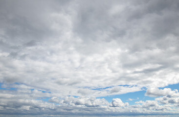 Sky replacement clouds puffy gray and white with blue sky