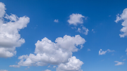 clear blue sky background,clouds with background, Blue sky background with tiny clouds. White fluffy clouds in the blue sky. 
Captivating stock photo featuring the mesmerizing beauty of the sky and cl