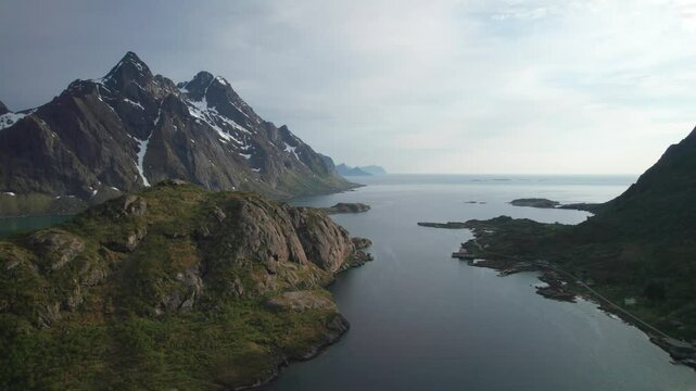 Lofoten Islands from Above: Cinematic Springtime Beauty of Fjords and Snow-Draped Mountain Tops