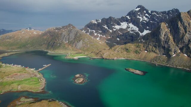 A Springtime Aerial Journey Over the Fjords and Snow-Dusted Peaks of the Lofoten Islands, Norway