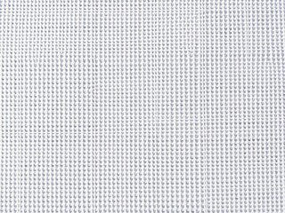 Close-up of canvas texture with visible weave pattern, creative