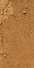 Grungy brown dirt texture background with rough, uneven surface, texture