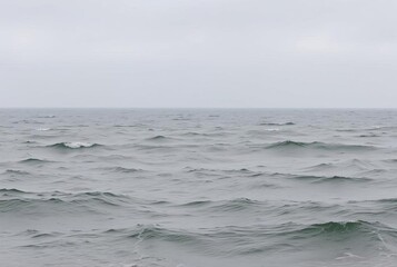 _. Molten Silver Under overcast skies, the sea appears as molten