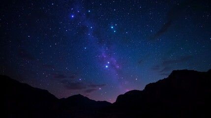 A photograph of a starry night sky filled with luminous stars of varying brightness, soft glowing nebulae in vibrant purples and blues. Radiant beams of starlight scatter faintly.