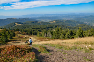 Backpacker on the trail from Korbielów to Pilsko