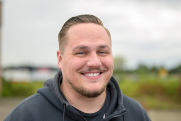 Happy Portrait of a Smiling Man Outdoors