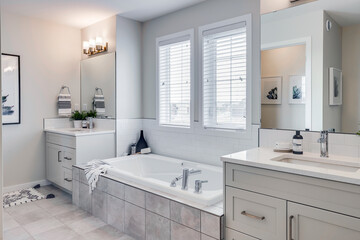 A bathroom with a bathtub and sink