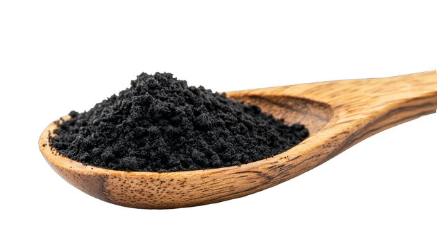 Side view presentation of black maca powder in a wooden spoon on white.